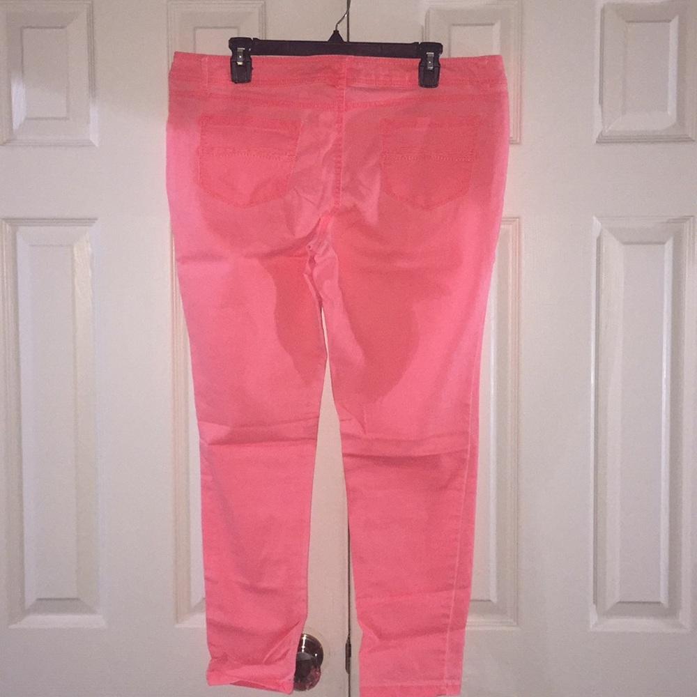 Neon coral skinny stretch jeans